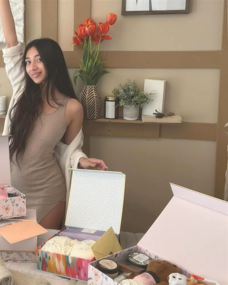 A new business owner celebrating in her finished studio